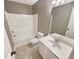 Clean bathroom with a combined tub and shower, and vanity at 1615 Cheshire Ct, Lawrenceville, GA 30043