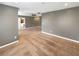 Spacious bedroom with carpet flooring, ceiling fan, and adjacent bathroom at 1615 Cheshire Ct, Lawrenceville, GA 30043