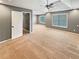 Expansive bedroom with tray ceilings, large windows, and adjoining room at 1615 Cheshire Ct, Lawrenceville, GA 30043