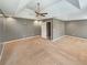 Large bedroom with a ceiling fan and tray ceiling at 1615 Cheshire Ct, Lawrenceville, GA 30043