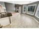 Eat-in kitchen features a bright breakfast nook with many windows at 1615 Cheshire Ct, Lawrenceville, GA 30043