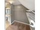 Walk-in closet with built-in shelving units and tan carpeting at 1615 Cheshire Ct, Lawrenceville, GA 30043