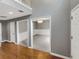 Foyer features hardwood floors, high ceilings, and neutral walls providing a welcoming entrance with sightlines to other rooms at 1615 Cheshire Ct, Lawrenceville, GA 30043