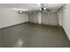 Spacious two-car garage with a clean epoxy floor and automatic door openers at 1615 Cheshire Ct, Lawrenceville, GA 30043