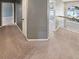 Hallway area with neutral carpet and views to adjoining rooms at 1615 Cheshire Ct, Lawrenceville, GA 30043