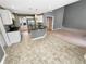 Open kitchen featuring stainless steel appliances, a breakfast bar, and tiled backsplash at 1615 Cheshire Ct, Lawrenceville, GA 30043