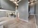 Living room with open staircase and flows into the modern kitchen at 1615 Cheshire Ct, Lawrenceville, GA 30043