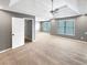 Main bedroom features tray ceiling, fan, neutral paint, carpet, and natural light from windows at 1615 Cheshire Ct, Lawrenceville, GA 30043