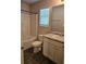 Bright bathroom with a tub, shower, and vanity with modern fixtures at 958 Fellowship Rd, Fairburn, GA 30213