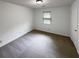 Bedroom featuring a window and carpet at 5942 Rock Court #5, Union City, GA 30291