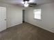 Bedroom featuring a ceiling fan, window and carpet at 5942 Rock Court #5, Union City, GA 30291