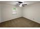 Bedroom featuring a ceiling fan and carpet at 5942 Rock Court #5, Union City, GA 30291