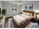 Cozy main bedroom features a ceiling fan and window blinds for comfort and privacy at 5942 Rock Court #5, Union City, GA 30291