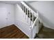 Stairway featuring classic white risers and stringers with a wood-look landing area at 5942 Rock Court #5, Union City, GA 30291