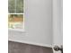 Bedroom with window and neutral walls at 3270 Forest Green Dr, Douglasville, GA 30135