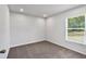 Bedroom with window and neutral walls at 3270 Forest Green Dr, Douglasville, GA 30135