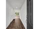Inviting foyer with sleek flooring, neutral walls, and views into an open living space at 3270 Forest Green Dr, Douglasville, GA 30135