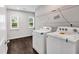 Bright laundry room with washer and dryer at 3270 Forest Green Dr, Douglasville, GA 30135
