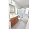 Updated bathroom with modern vanity, ample storage, and shower with glass doors at 1177 Church St # F, Decatur, GA 30030