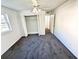 Cozy bedroom with ceiling fan, neutral carpet, and closet for storage at 1177 Church St # F, Decatur, GA 30030