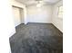 Bright bedroom with natural light, neutral carpet, and closet for storage at 1177 Church St # F, Decatur, GA 30030
