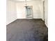 Open dining room space with chandelier and neutral decor at 1177 Church St # F, Decatur, GA 30030