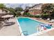 This is a community swimming pool surrounded by lounge chairs at 1177 Church St # F, Decatur, GA 30030