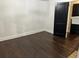 Spacious bedroom with dark hardwood floors and neutral walls at 1134 Donnelly Sw Ave, Atlanta, GA 30310