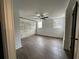 Spacious bedroom with exposed brick wall and wood-look tile flooring at 1134 Donnelly Sw Ave, Atlanta, GA 30310