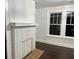 White brick fireplace with tile hearth in living room at 1134 Donnelly Sw Ave, Atlanta, GA 30310