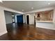 Open concept living area with dark hardwood floors at 1134 Donnelly Sw Ave, Atlanta, GA 30310