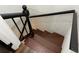 Wooden staircase with black railings at 1134 Donnelly Sw Ave, Atlanta, GA 30310