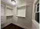 Large walk-in closet with built-in shelves and drawers at 1134 Donnelly Sw Ave, Atlanta, GA 30310