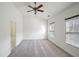 Bright bedroom featuring hardwood floors and a ceiling fan at 2853 Brandl Cove Ct # 1, Marietta, GA 30067