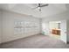 Spacious bedroom with carpeting, ceiling fan, and en-suite bathroom access at 2853 Brandl Cove Ct # 1, Marietta, GA 30067