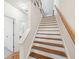 Bright, open staircase with wooden steps and white risers at 2853 Brandl Cove Ct # 1, Marietta, GA 30067