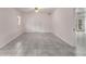 Unfinished basement room with tile floor and access to exterior at 1553 Alcovy Rd, Lawrenceville, GA 30045