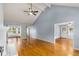 Bright living room with hardwood floors, vaulted ceilings, and access to backyard at 1553 Alcovy Rd, Lawrenceville, GA 30045