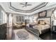 Spacious main bedroom with dark wood furniture and coffered ceiling at , Lawrenceville, GA 30045