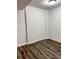 Basement featuring hardwood floors at 6185 Bermuda St, Forest Park, GA 30297