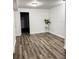 Open basement space with hardwood flooring at 6185 Bermuda St, Forest Park, GA 30297