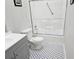 Clean bathroom with a shower/tub combo and hexagon tile floor at 2961 Hawk Se Ct, Marietta, GA 30067