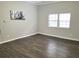 Living room with hardwood floors and a large window at 2961 Hawk Se Ct, Marietta, GA 30067