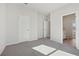 Bedroom with plush carpeting and an attached bathroom at 24 Dew Lake Ct, Grayson, GA 30017
