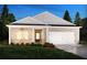 Charming single-story home with a brick facade, manicured lawn, and a two-car attached garage at 24 Dew Lake Ct, Grayson, GA 30017