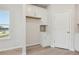 Eat-in kitchen nook featuring convenient built-in cabinetry and a view to the outdoors at 24 Dew Lake Ct, Grayson, GA 30017