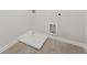 Modern laundry area with practical flooring and utility connections at 24 Dew Lake Ct, Grayson, GA 30017