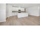 Spacious living area featuring hardwood floors, ample natural light, and an open layout at 24 Dew Lake Ct, Grayson, GA 30017