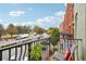 Balcony view of a street and townhomes at 320 Town Center Ave # U206B, Suwanee, GA 30024