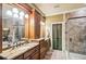 Spa-like bathroom with double vanity, soaking tub, and separate shower at 320 Town Center Ave # U206B, Suwanee, GA 30024